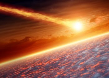 An artists rendering showing an asteroid entering Earth's atmosphere. Shutterstock.