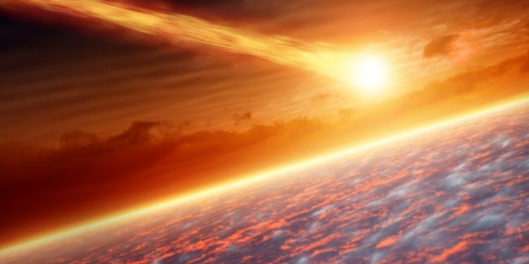 An artists rendering showing an asteroid entering Earth's atmosphere. Shutterstock.