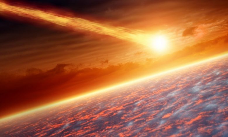 An artists rendering showing an asteroid entering Earth's atmosphere. Shutterstock.