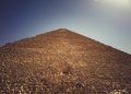 A view of the Great Pyramid of Giza, its entrance and people accessing it. Shutterstock.