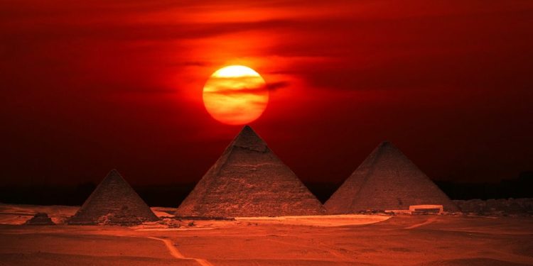 The Pyramids at Giza at sunset. Shutterstock.