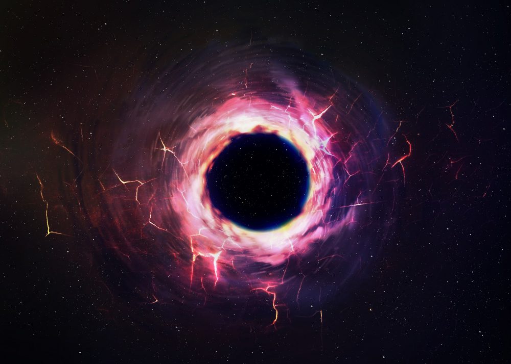 An artists rendering of a black hole in the cosmos. Shutterstock.