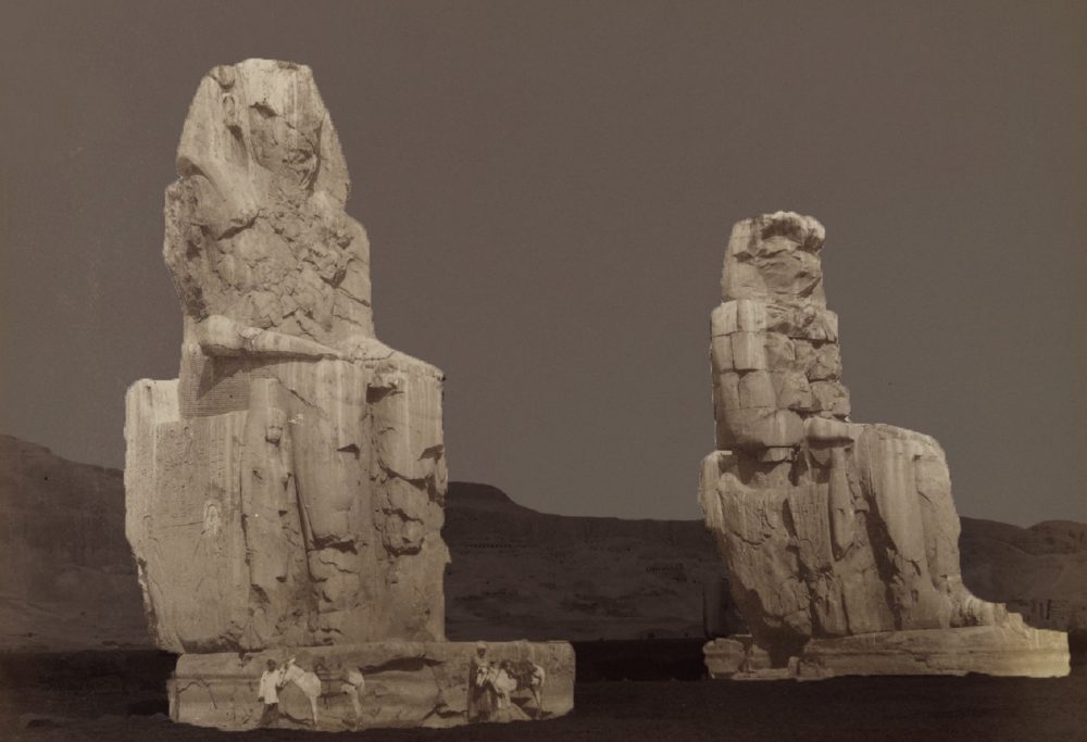An image of the Colossi of Memnon by Antonio Beato. 19th century. Image Credit: Brooklyn Museum.