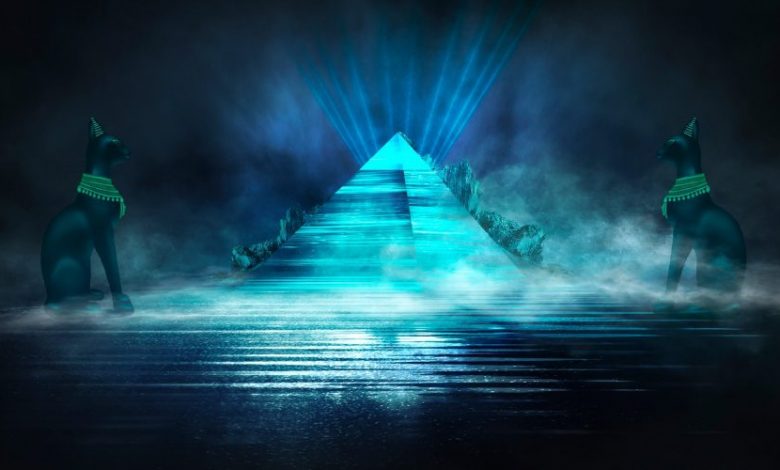 Artists illustration of a pyramid guarded by cats. Shutterstock.