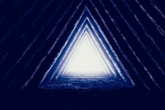 An artists rendering of light inside a pyramid. Shutterstock.