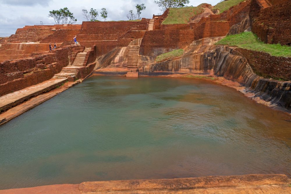 An image of the top of the Sigiriya rock fortress and its water gardens. Shutterstock.