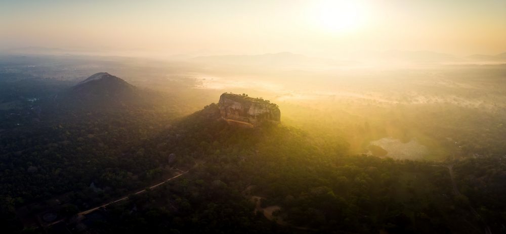 A stunning photograph of the sunrise over Sigiriya. Shutterstock.