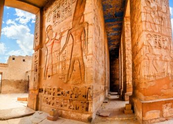 An image of the Temple of Medinet Habu. Egypt, Luxor. Shutterstock.
