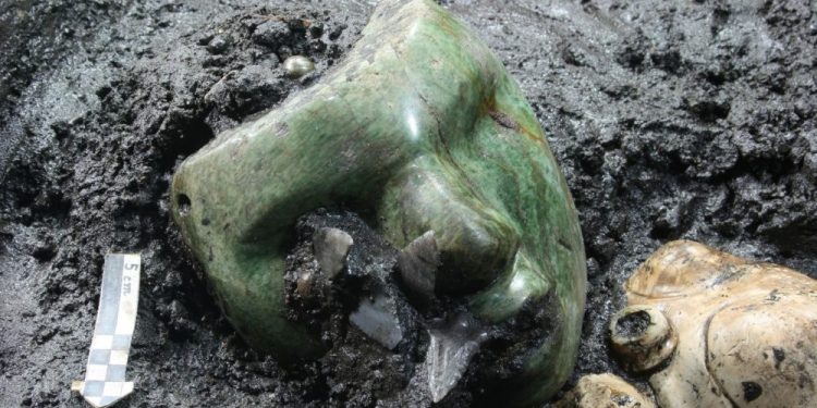 An image of the green serpentine mask discovered at the base of the Pyramid of the Sun in Teotihuacan. Image Credit: INAH.