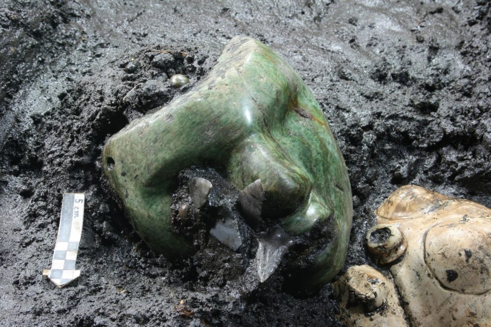 An image of the green serpentine mask discovered at the base of the Pyramid of the Sun in Teotihuacan. Image Credit: INAH.