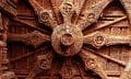 An image of the intricate carvings on the stone wheel of the Konark Sun Temple. Shutterstock.