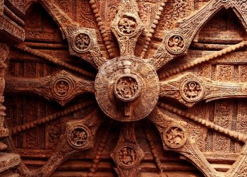 An image of the intricate carvings on the stone wheel of the Konark Sun Temple. Shutterstock.