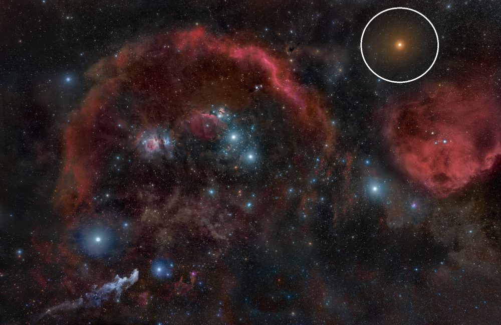 An image showing Betelgeuse (upper right) and the dense nebulae of the Orion Molecular Cloud Complex. Image Credit: Wikimedia Commons / CC BY-SA 3.0.