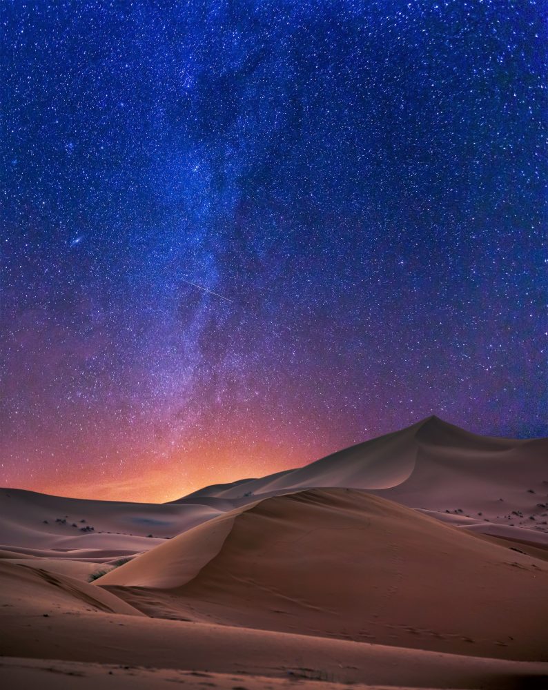 An image of the Sahara Desert and the night sky. Shutterstock.