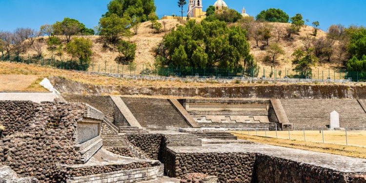 An image of the ruins of the Great Pyramid of Cholula with the Church of Our Lady of Remedies built on top of the pyramid. Shutterstock.