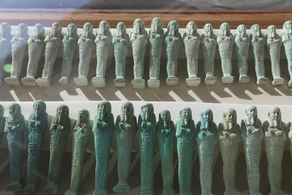 A photograph showing the figurines discovered by archaeologists during excavations. Image Credit: Egyptian Ministry of Tourism and Antiquities / Facebook.
