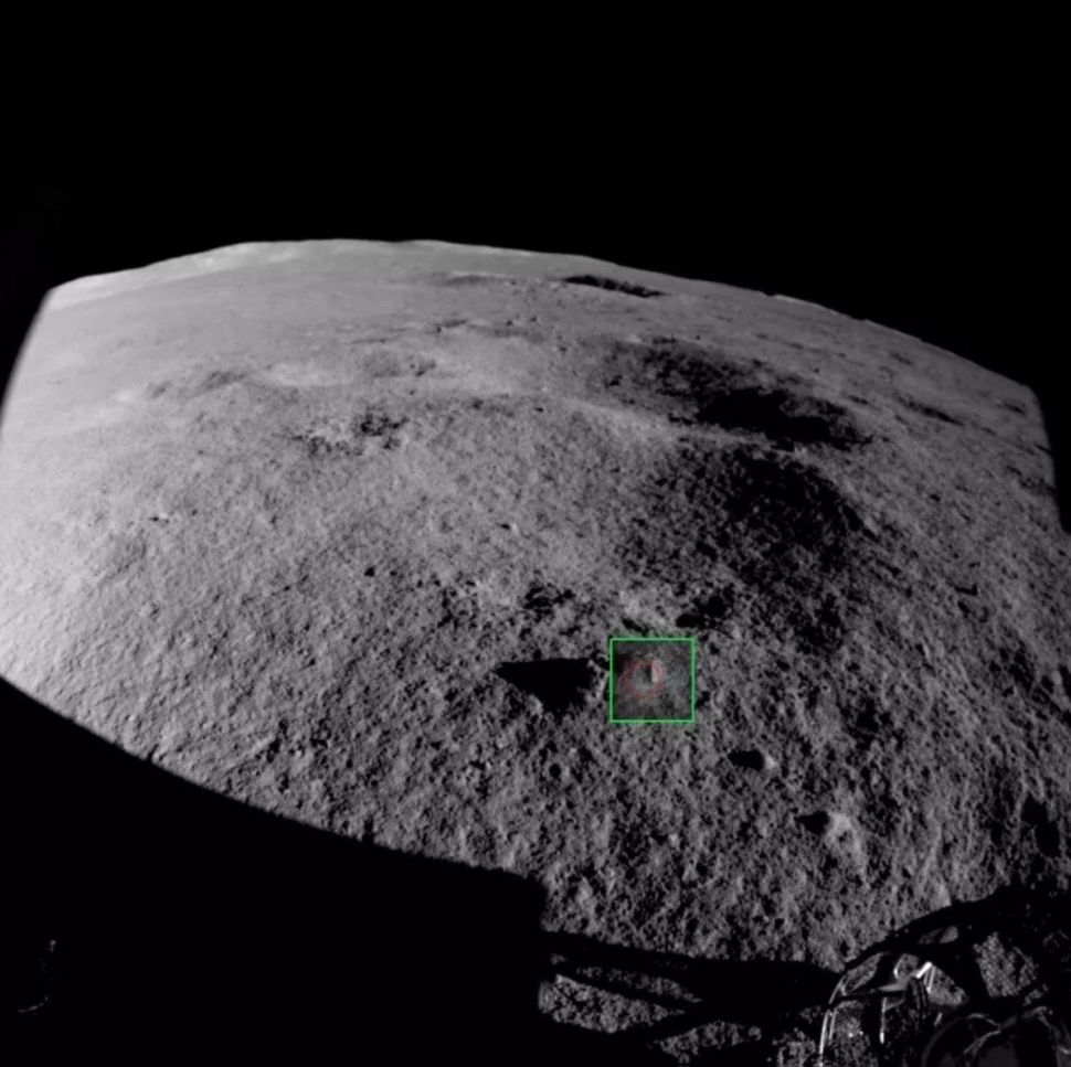 A view of the far side of the moon and the enigmatic rocks in question. Image Credit: CNSA / CLEP/ Our Space.