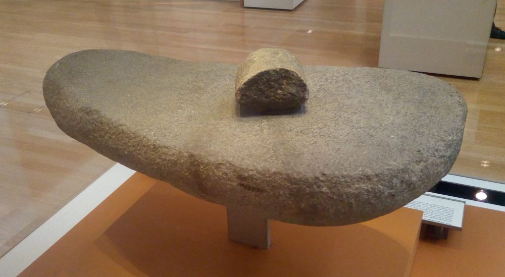An image of a grinding stone. Larger and smaller stones were used to grind cereals at Abu Hureyra. This tool is beleived to date back from around 9,500 BC. Image Credit: Wikimedia Commons.