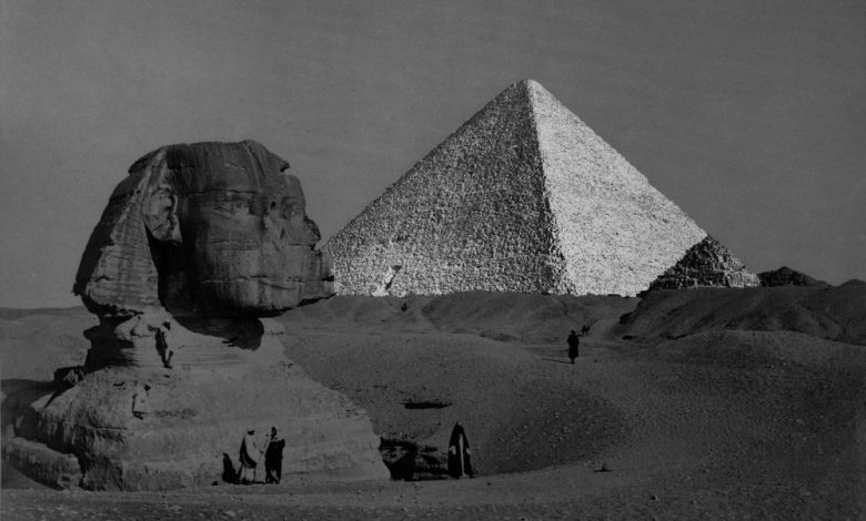 The Great Sphinx with the Pyramid of Pharaoh Cheops in the background. 1877 photo by French photographer Henri Bechard. Shutterstock.