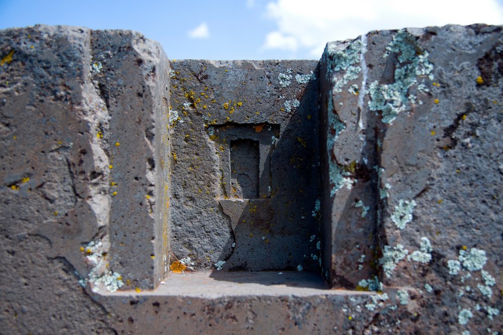 A close-up image of one of the intricately decorated stones at Puma Punku. Shutterstock.