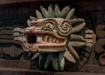 An ancient statue depicting the feathered serpent Quetzalcoatl. Shutterstock.