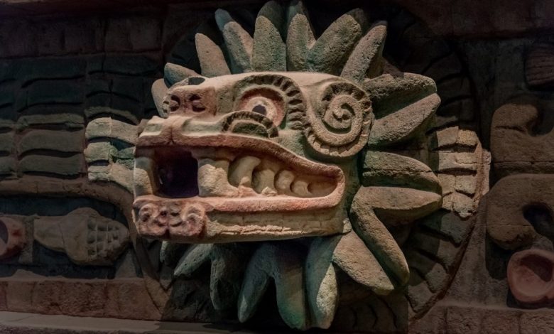 An ancient statue depicting the feathered serpent Quetzalcoatl. Shutterstock.
