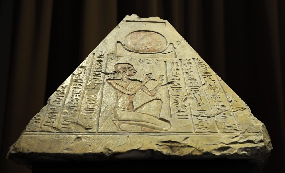 A front view of an ancient Egyptian pyramidion from the tomb of the priest Rer in Abydos, Egypt, 7th century BC. Shutterstock.