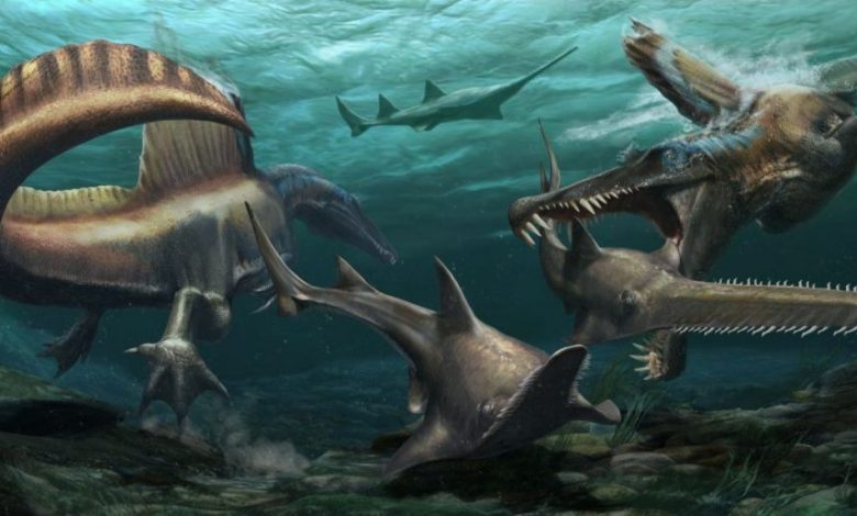 An artists illustration of a swimming dinosaur. Image Credit: Jason Treat, NG Staff, and Mesa Schumacher Art: Davide Bonadonna Source: Dr. Nizar Ibrahim, University of Detroit Mercy.