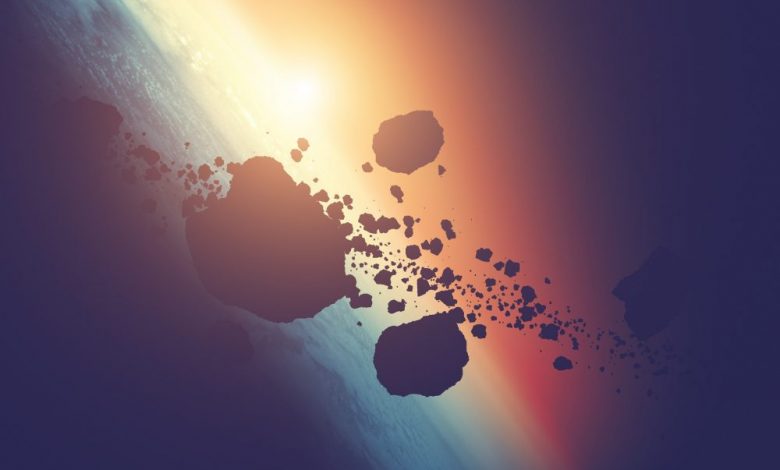 Artists rendering of asteroids in orbit. Shutterstock.