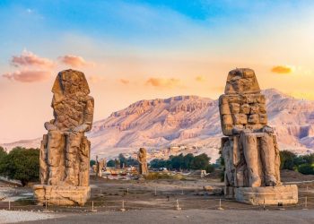 An image of the Colossi of Memnon. Shutterstock.