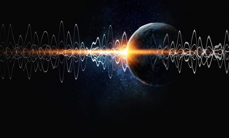 An artist's rendering of seismic waves and Earth in the background. Shutterstock.