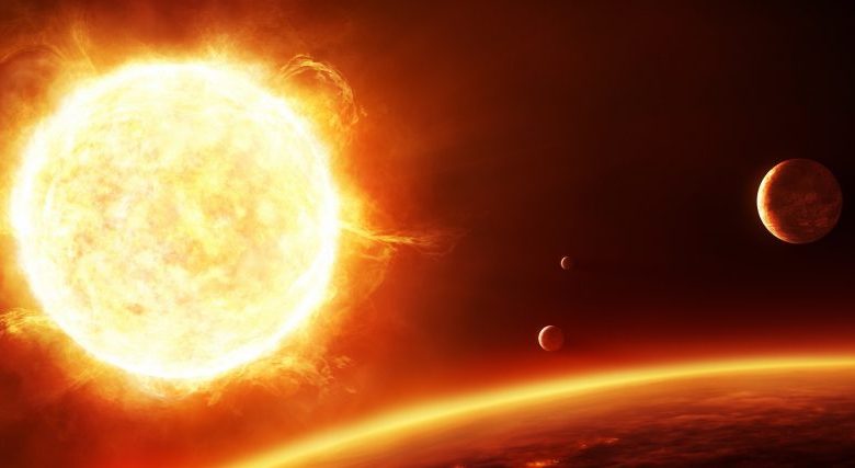 An artists rendering of a distant solar system with various exoplanets. Shutterstock.