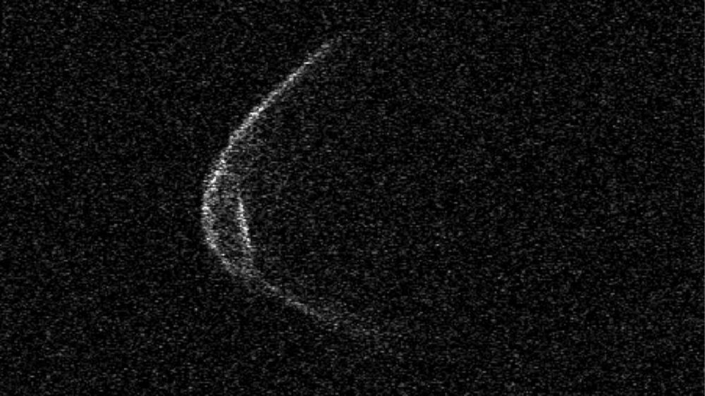 An image of asteroid 1998 OR2 which makes it look as if the asteroid was wearing a mask. Image Credit: Arecibo Observatory.
