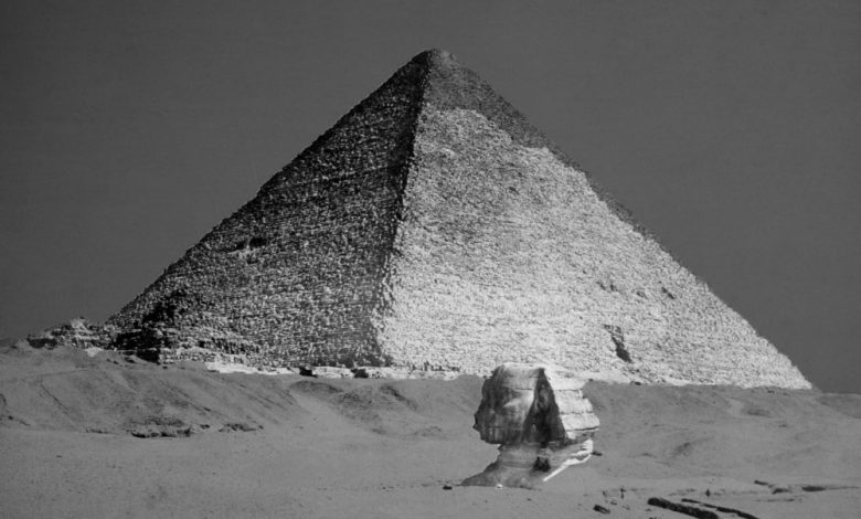 A rare image of the Great Pyramid of Giza and the Sphinx still buried beneath the surface. Shutterstock.