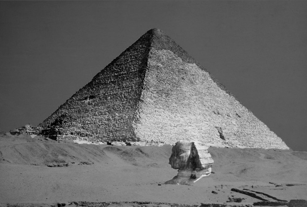 A rare image of the Great Pyramid of Giza and the Sphinx still buried beneath the surface. Shutterstock.