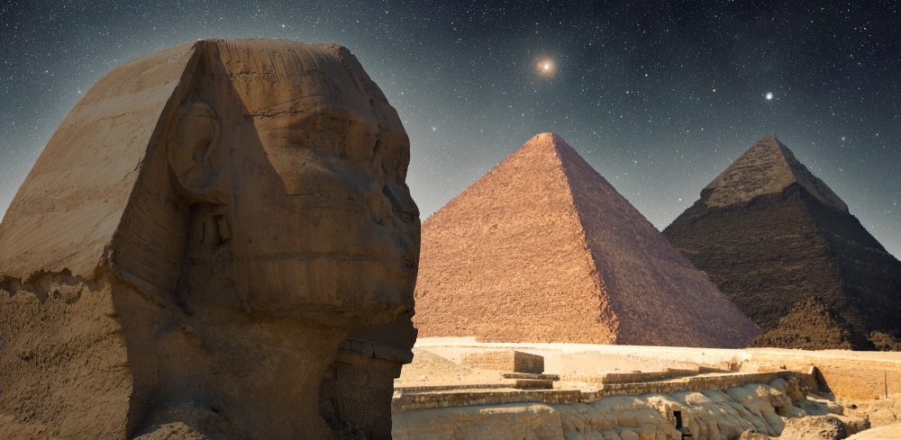 An image of the Sphinx, the Pyramid of Khafre, and the Great Pyramid of Giza in the middle. Shutterstock.