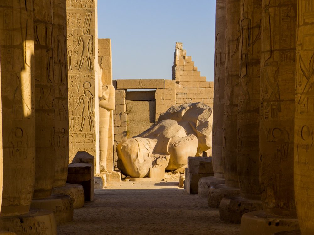 A view of the massive statue of Ramses II in the Ramesseum Temple in Luxor. Shutterstock.