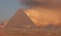 An image of the Great Pyramid of Giza with a sand storm in the background. Shutterstock.