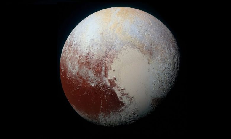 High-resolution MVIC image of Pluto in enhanced color to bring out differences in surface composition. Image Credit: NASA / Wikimedia Commons.