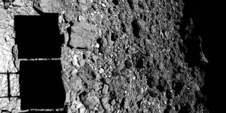 An image of Hayabusa2 landing on asteroid Ryugu. Image Credit: JAXA.