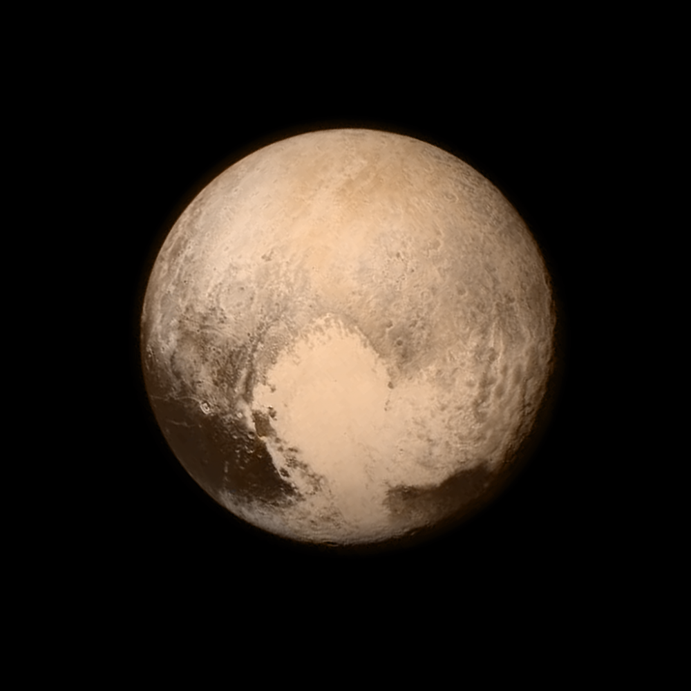 Pluto's Big Heart in Color. This Image was taken on July 13, 2015 at a distance of 476,000 miles (768,000 Kilometers) from the surface. Shutterstock.