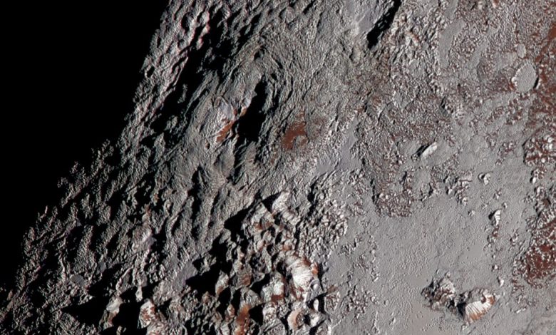 An image of Pluto’s Wright Mons in color. It shows of one of two potential cryovolcanoes spotted on the surface of Pluto by the New Horizons spacecraft in July 2015. Image Credit: New Horizons.