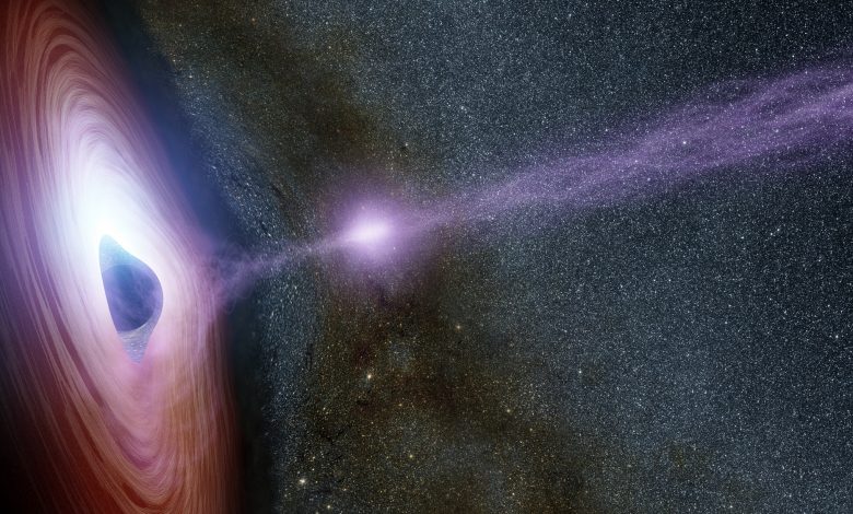 A supermassive black hole is depicted in this artist's concept, surrounded by a swirling disk of material falling onto it. Credits: NASA/JPL-Caltech