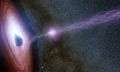 A supermassive black hole is depicted in this artist's concept, surrounded by a swirling disk of material falling onto it. Credits: NASA/JPL-Caltech