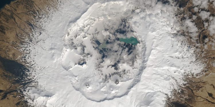 Umnak Island. Landsat caught a rare glimpse of the third-largest Aleutian Island. Image Credit: NASA Earth Observatory images by Joshua Stevens, using Landsat data from the U.S. Geological Survey.