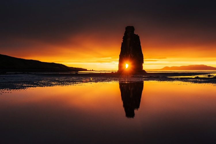 Sunset on a lake. Shutterstock.