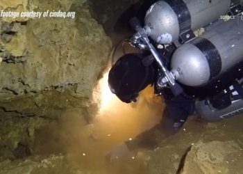 A screenshot showing a diver exploring the now sunken ochre mine in Quintana Roo, Mexico. Image Credit: McMaster University / Vimeo.
