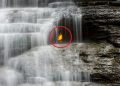 A close-up of the gas-lit flame below Eternal Flame Falls in Chestnut Ridge Park, Orchard Park, NY. Image Credit: Wikimedia Commons.