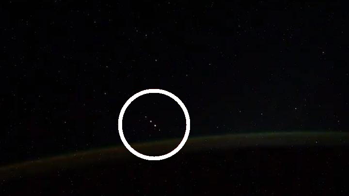 A screenshot of the video showing the alleged UFOs spotted by Russian Cosmonaut Ivan Vagner aboard the ISS. Image Credit: Ivan Vagner / ISS.