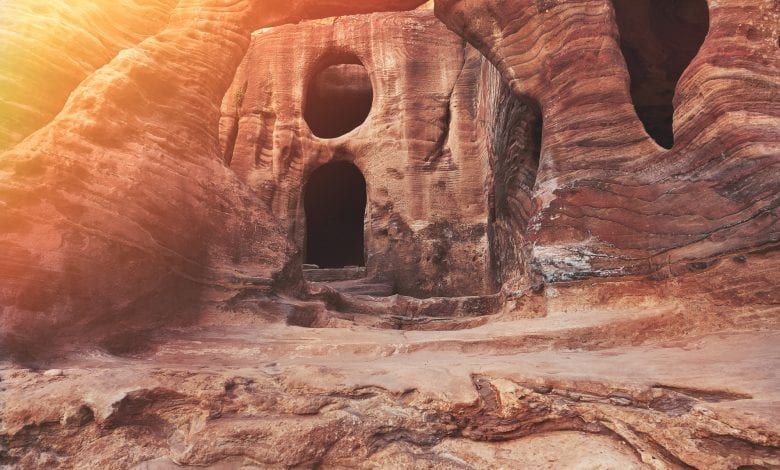 An artist's illustration of a lost city cut in stone. Shutterstock.
